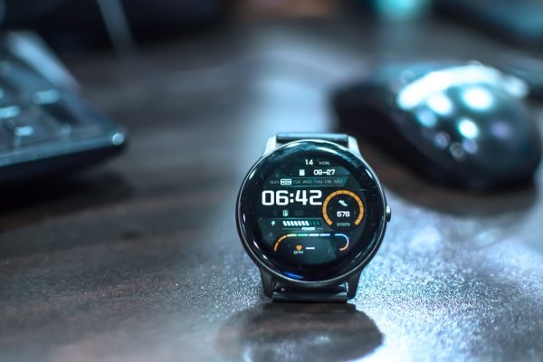 A smartwatch displayed on a desk