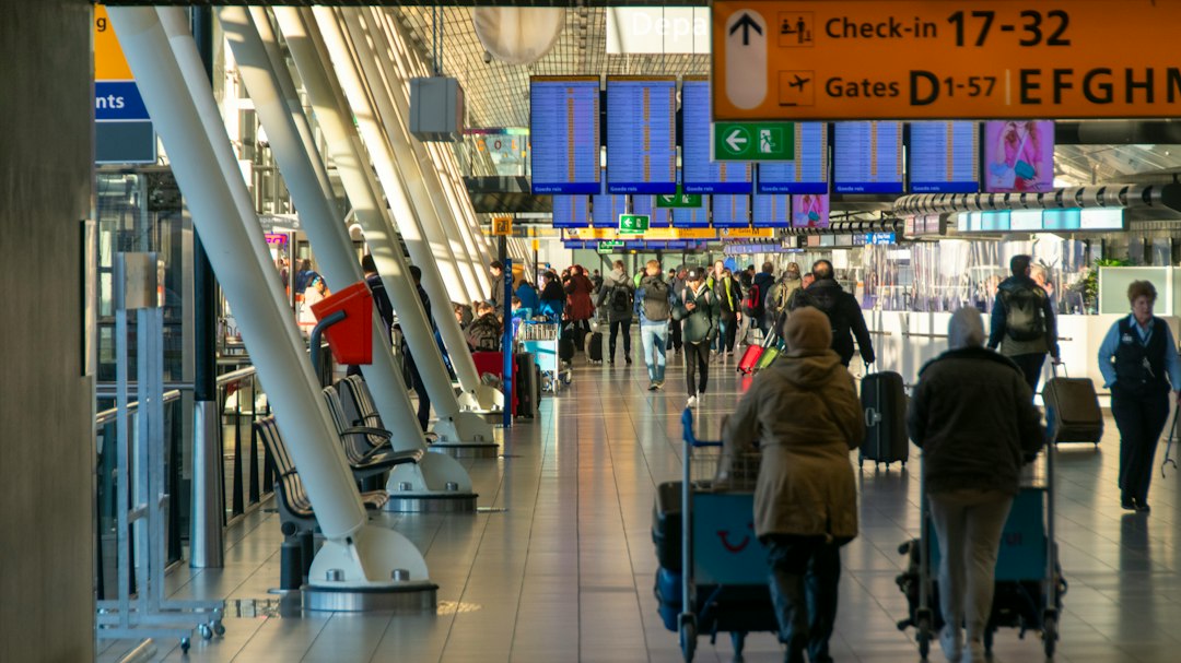 Travelers inside an airport terminal, used as an illustrative image for flight disruptions at Riyadh airport