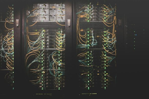 Rows of network servers in a data center, used as an illustrative image for artificial intelligence systems