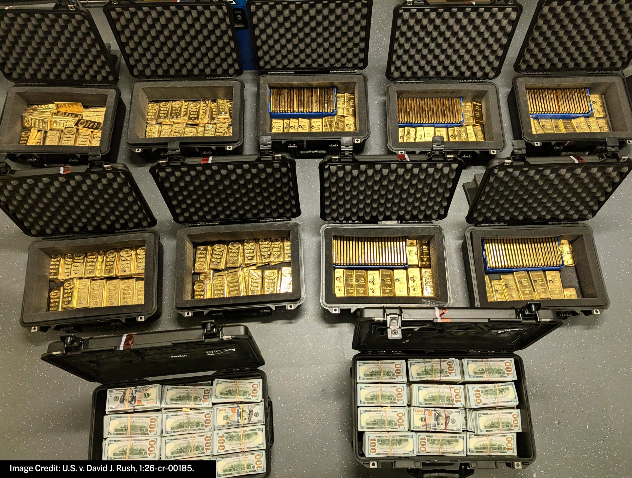 Cash and gold bars recovered by the FBI during a search of David J. Rush's residence, according to the U.S. Attorney's Office for the Eastern District of Virginia.