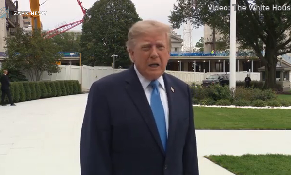 President Trump speaks to reporters on the South Lawn of the White House